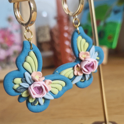Boucles d’oreilles papillon fleuri