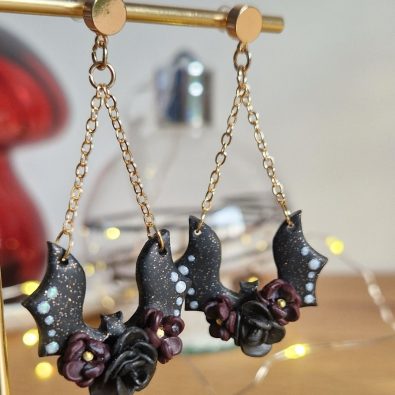 boucles d'oreille chauve souris noire pailletes et fleurs